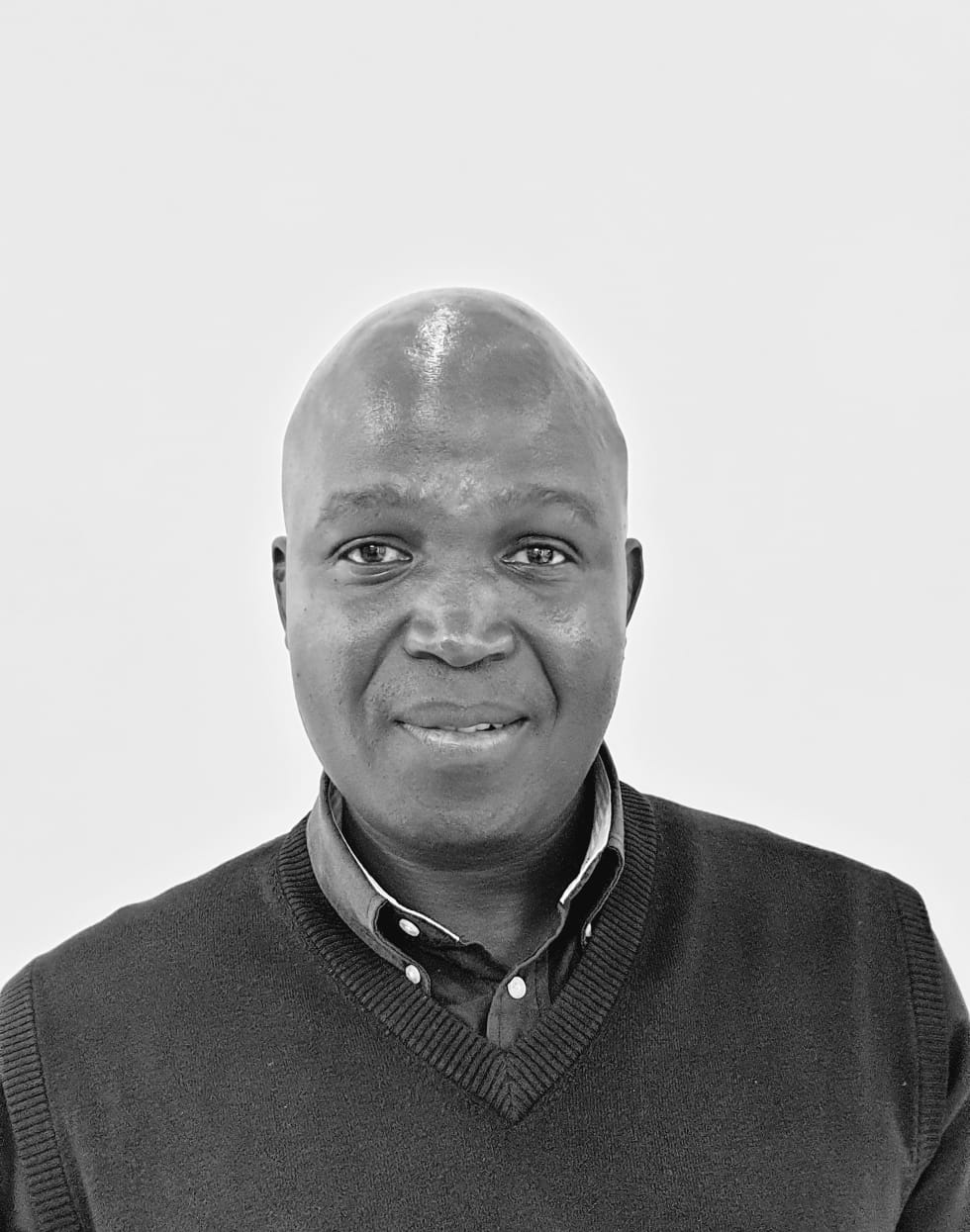 Professional portait photograph of Simon Makhumesane