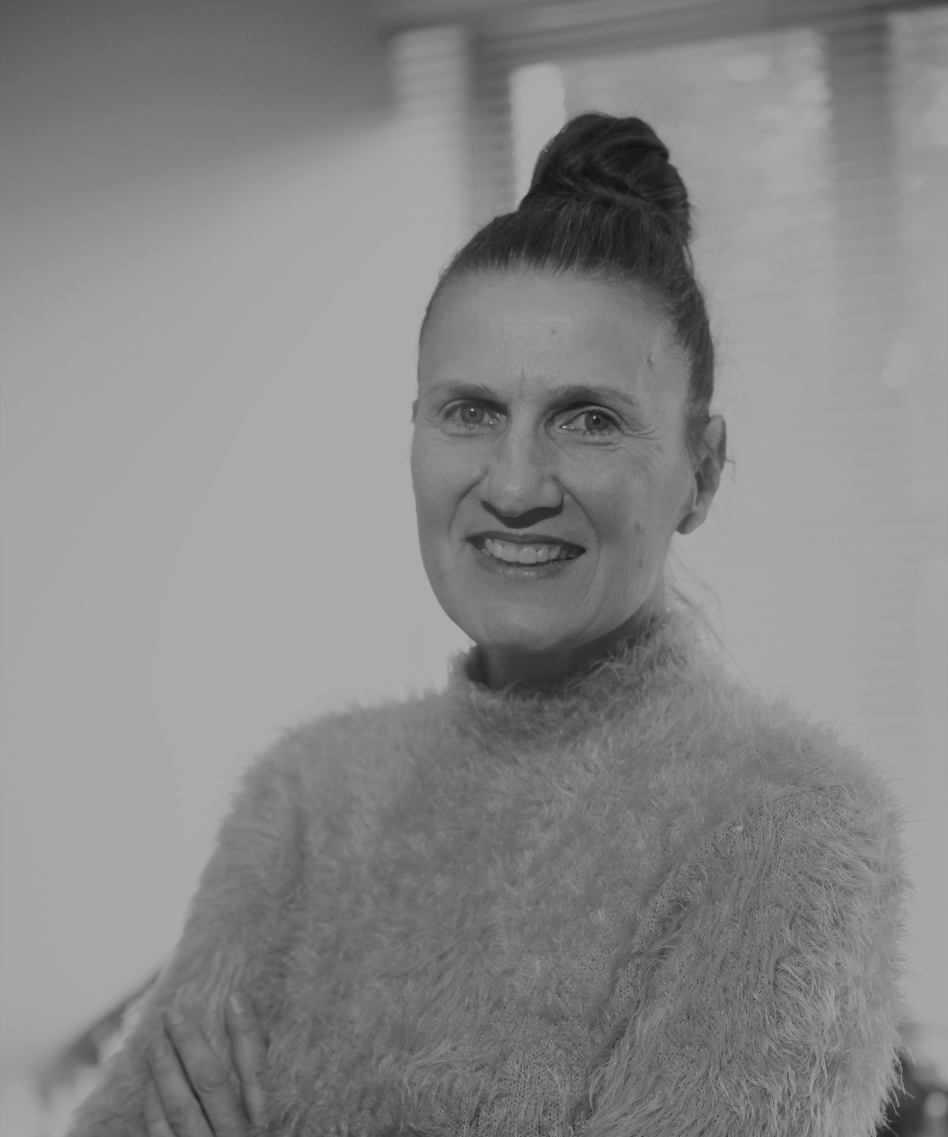 Professional portait photograph of Rina Wray
